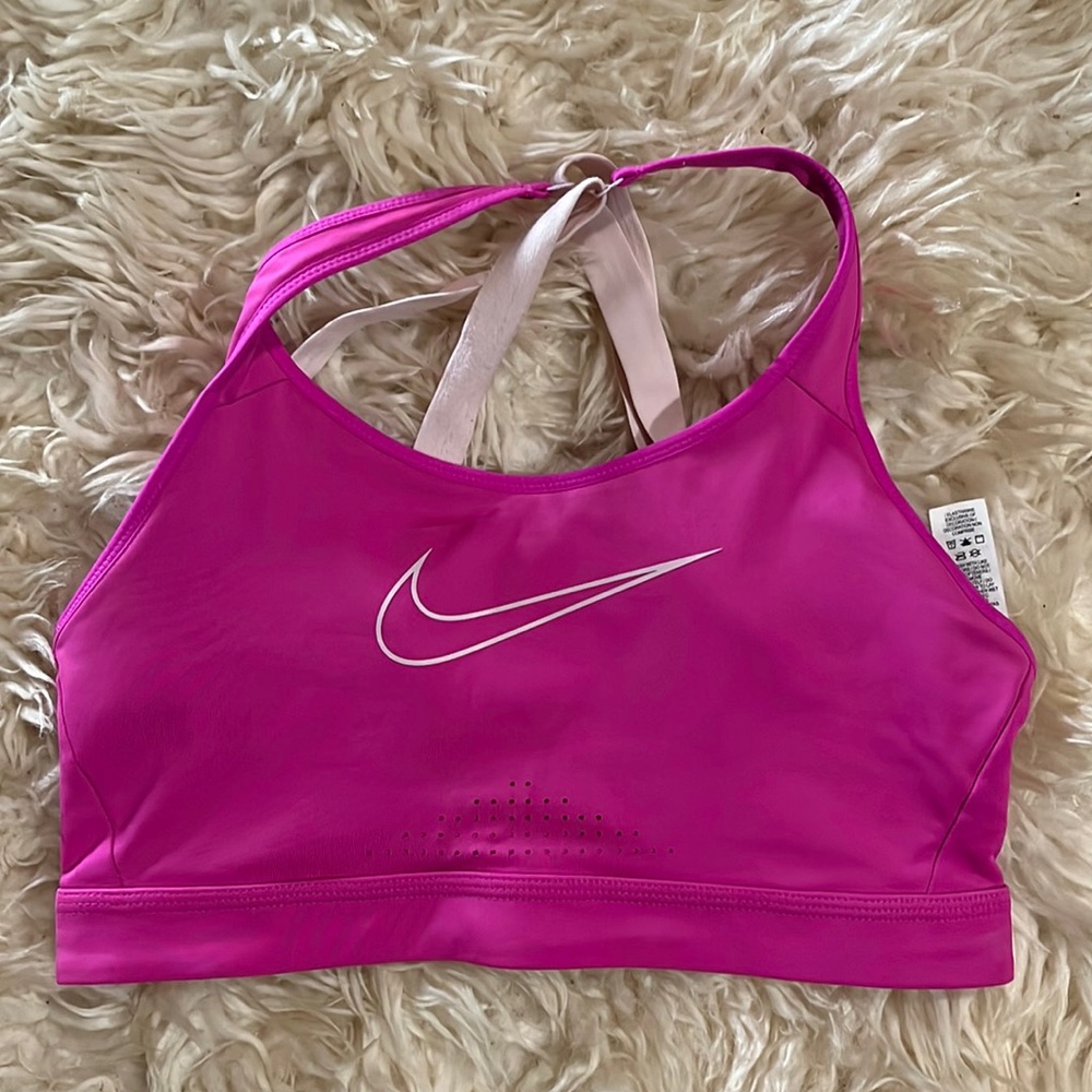 Adjustable pink Nike sports bra.